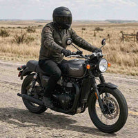 Motorcycle jacket worn by rider on open road